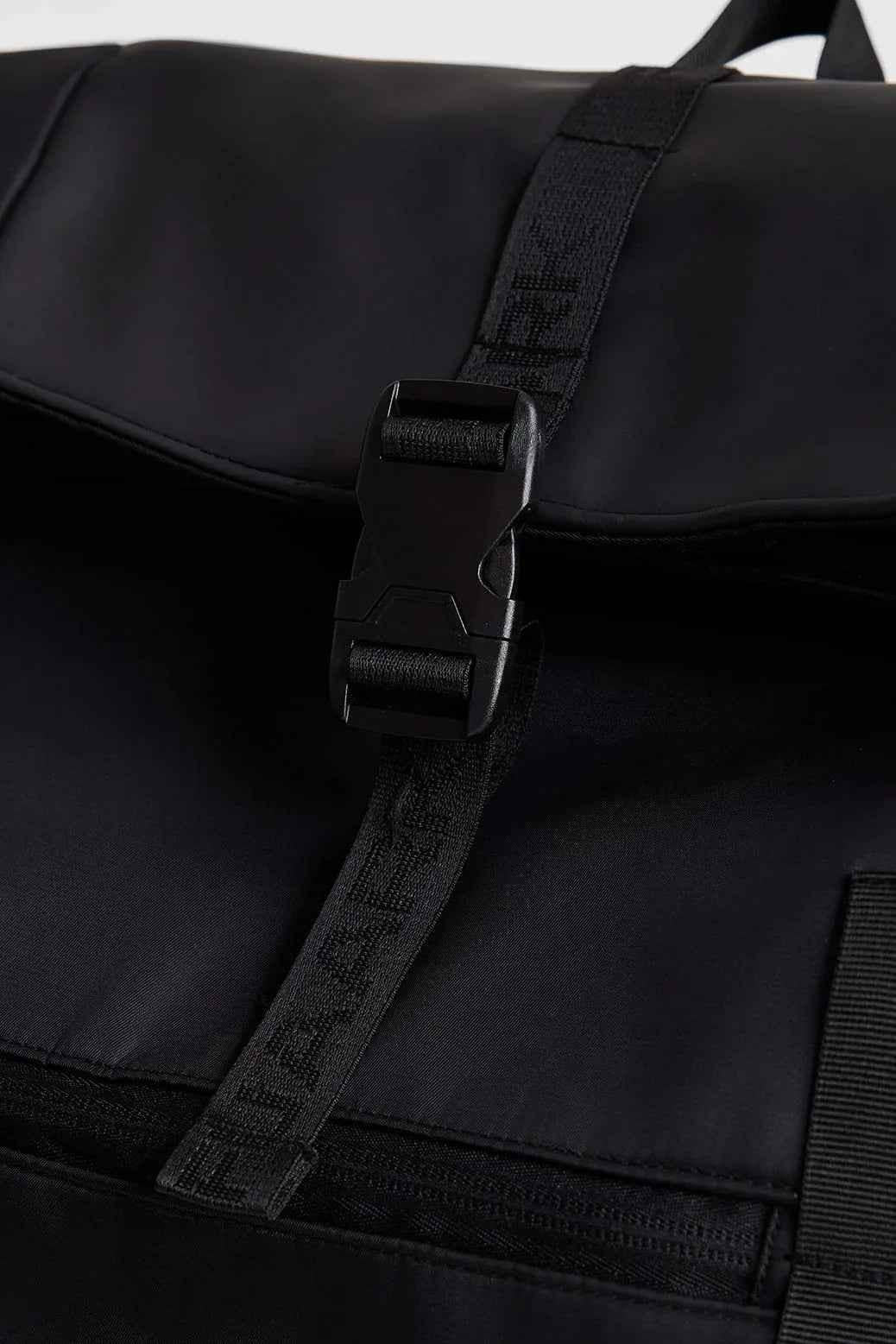 Fuaark Nz Core Black Backpack Bag showing a sleek, stylish design with multiple compartments for everyday use