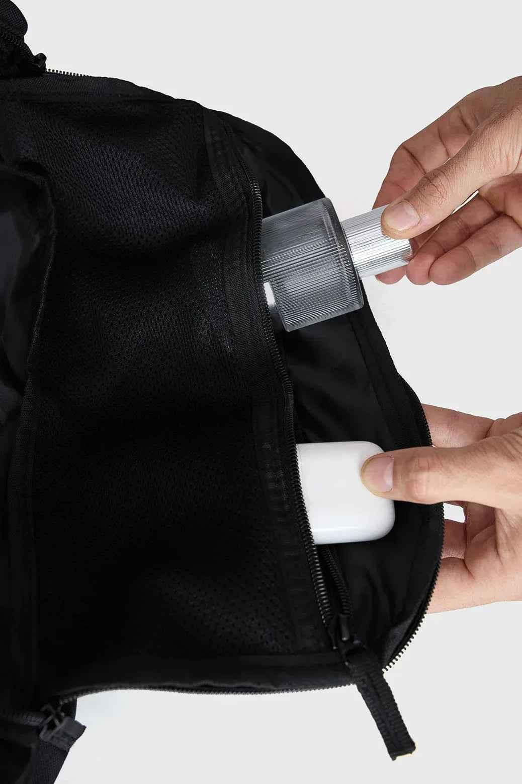 Black Fuaark Nz duffle bag with sturdy handles and zipper, ideal for stylish travel and daily use.