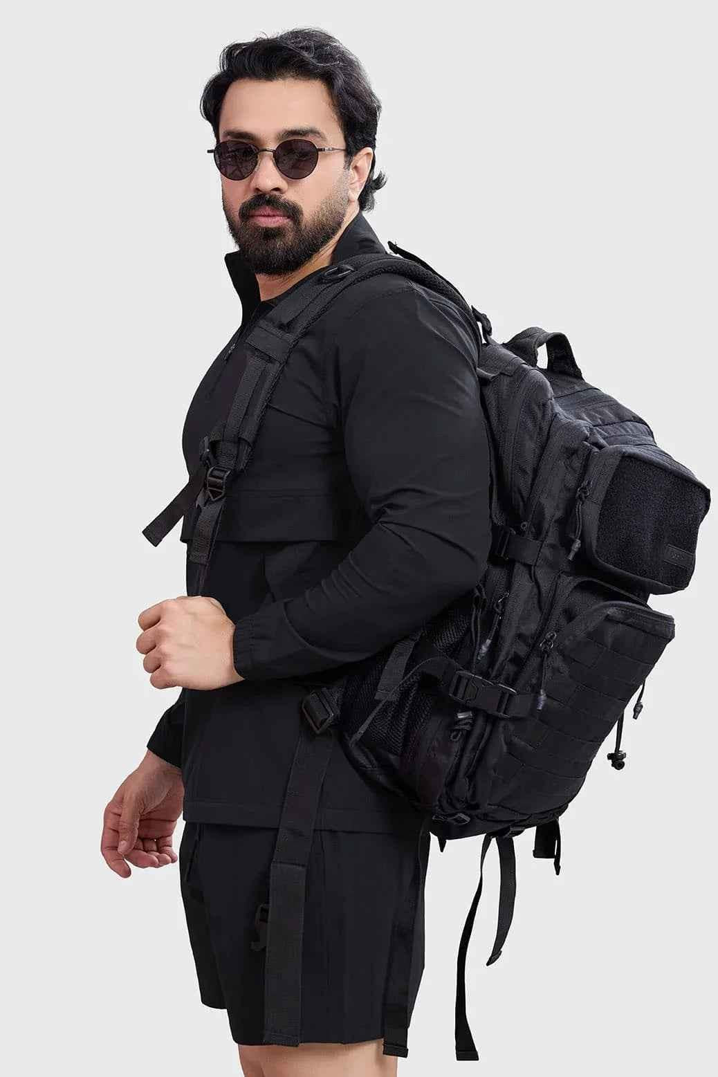 Fuaark NZ Ironclad Tactical Backpack in black with multiple compartments, adjustable straps, and durable military-style design.