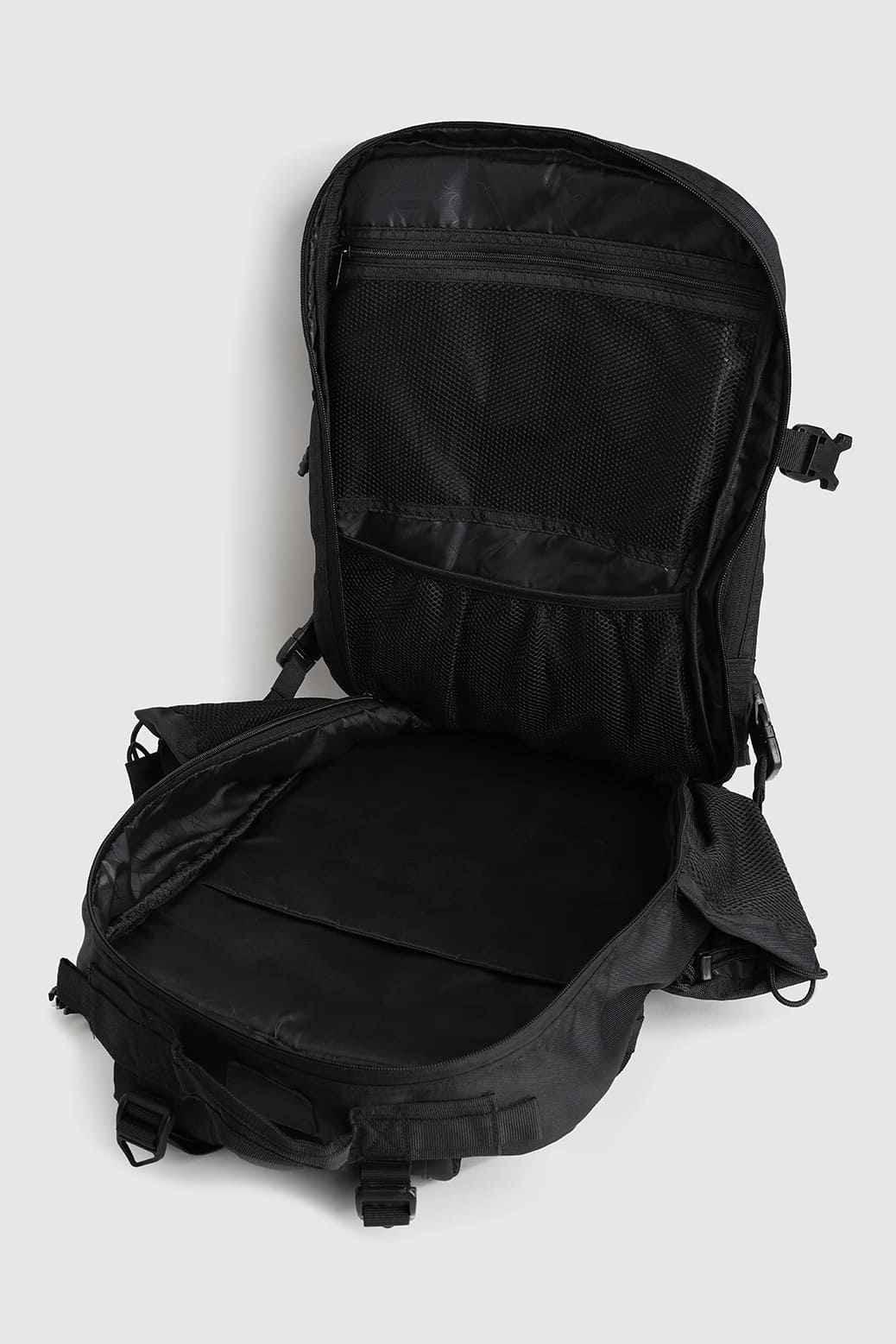 Black Ironclad Tactical Backpack by Fuaark Nz, durable bag with multiple compartments and sturdy straps for outdoor or tactical use.