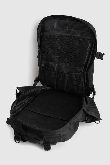 Black Ironclad Tactical Backpack by Fuaark Nz, durable bag with multiple compartments and sturdy straps for outdoor or tactical use.
