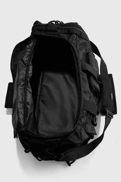 Black Fuaark Nz Peak Hybrid Bag, versatile and stylish backpack with multiple compartments and padded shoulder straps.