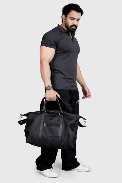 Black Vault Duffle Bag by Fuaark Nz, showing sturdy design and spacious interior for travel and gym use.