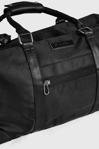 Black Vault Duffle Bag by Fuaark NZ, shown with sturdy handles and spacious interior for travel or gym use.