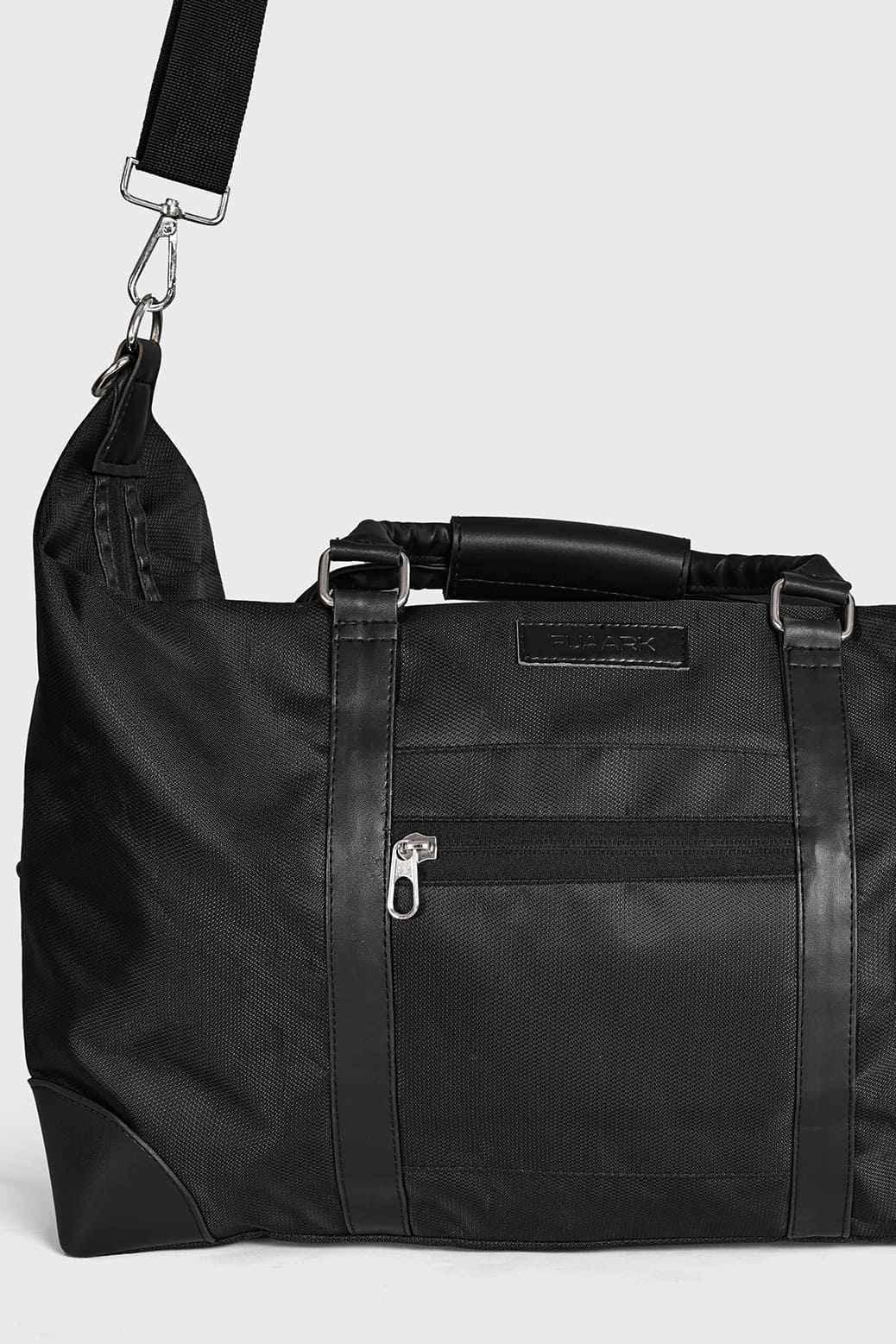 Fuaark Nz Vault Duffle Bag in black showing a spacious fabric bag with handles and a sleek, minimalist design.