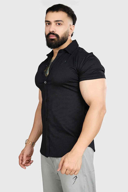 Black Aero casual shirt by Fuaark Nz with a relaxed fit and button-front design, shown on a model.