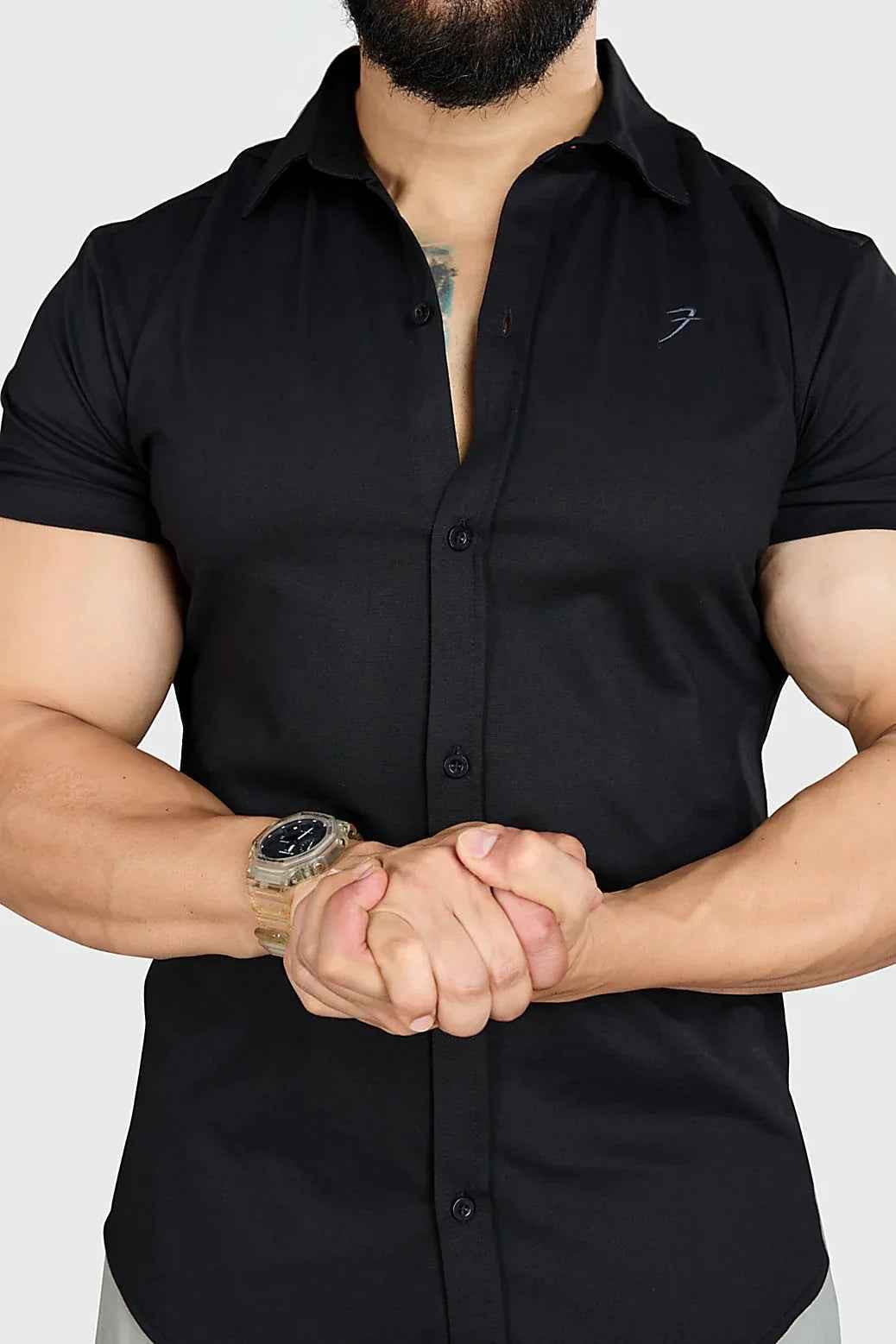Fuaark Nz Aero Black casual shirt, lightweight fabric, classic fit, short sleeves, and collar, displayed on a hanger.