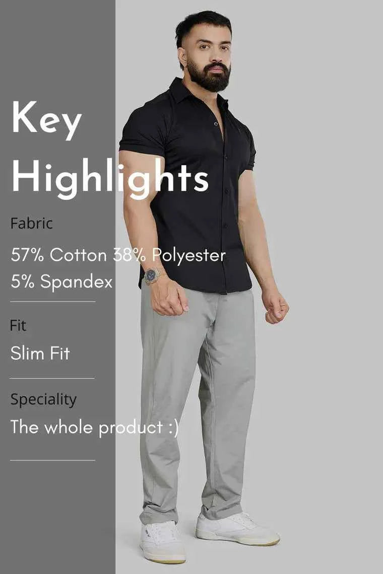 Black Aero casual shirt by Fuaark Nz, featuring a relaxed fit and stylish design, shown on a model.