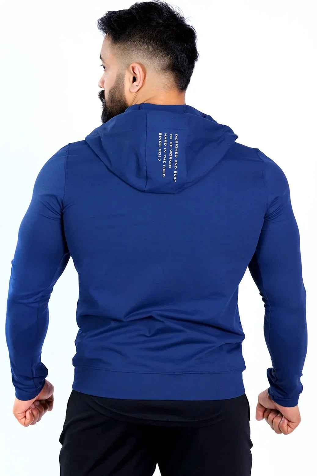 Fuaark Nz navy Signature Nylon Jacket shown on a hanger, lightweight coat with a sleek design and durable nylon fabric.