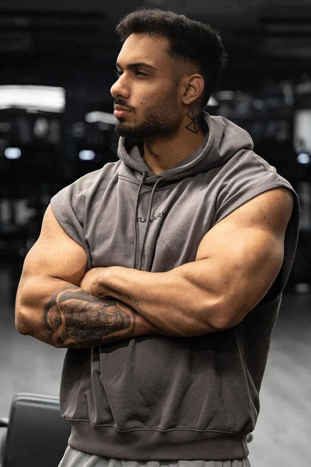 Dark grey Fuaark NZ Signature cap sleeve hoodie with a relaxed fit, featuring a hood and short sleeves.