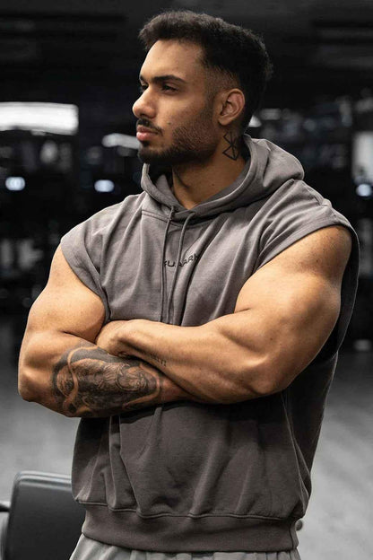 Dark grey Fuaark NZ Signature cap sleeve hoodie with a relaxed fit, featuring a hood and short sleeves.
