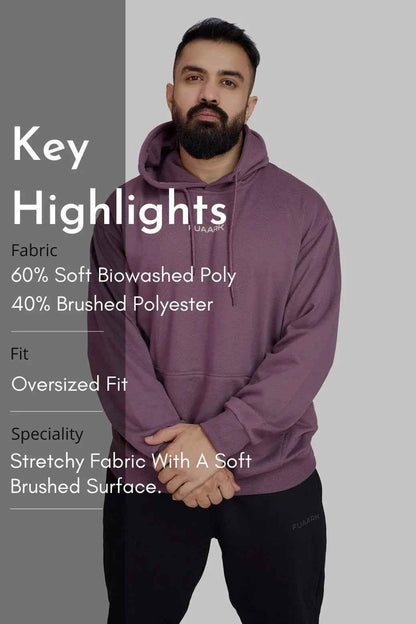 Fuaark Nz Signature Oversized Mauve Hoodie, soft fabric, relaxed fit, casual style, worn by a model.