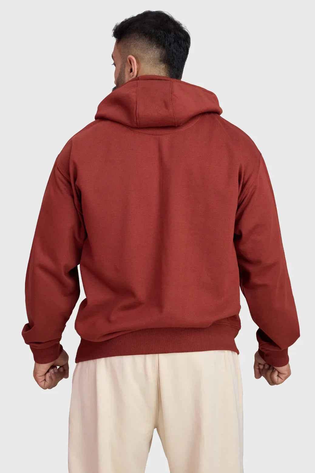Fuaark Nz Signature Oversized Rust Hoodie, cozy and stylish, shown on a model with a relaxed fit and soft fabric.