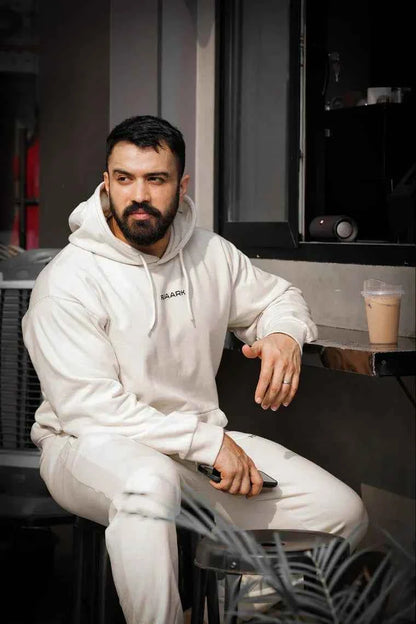Beige unisex oversized hoodie by Fuaark Nz, showcasing a comfortable, stylish fit with a relaxed silhouette.