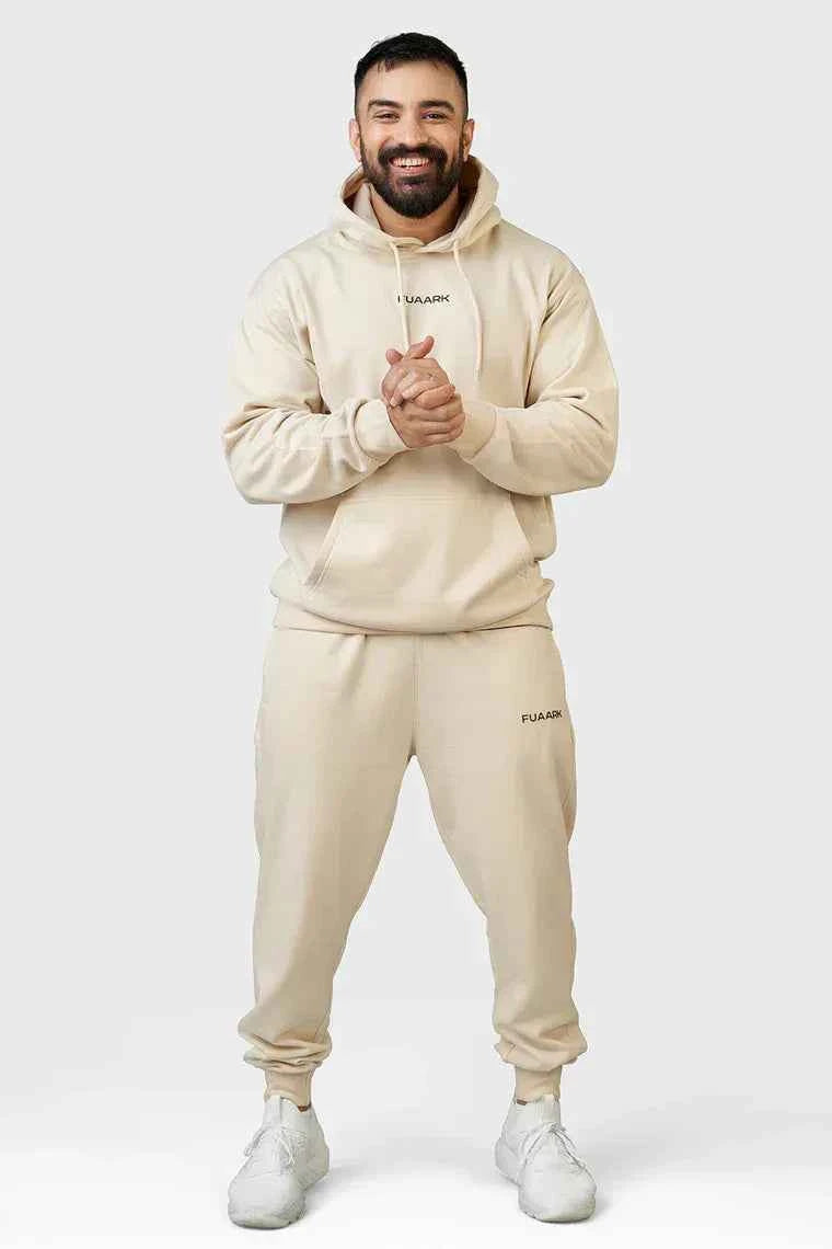 Beige unisex oversized hoodie by Fuaark Nz, featuring a relaxed fit and stylish comfort, perfect for casual wear.