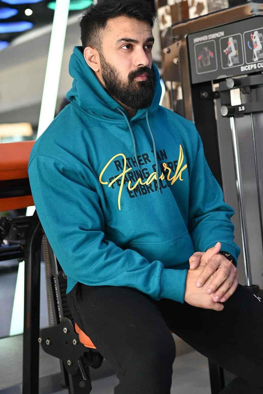 Oversized teal hoodie from Fuaark Nz, featuring a soft, comfortable fit and stylish design for casual wear.