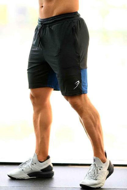 Black and blue Fuaark Nz jogger shorts, stylish and comfortable box shorts for casual wear, shown on a model.