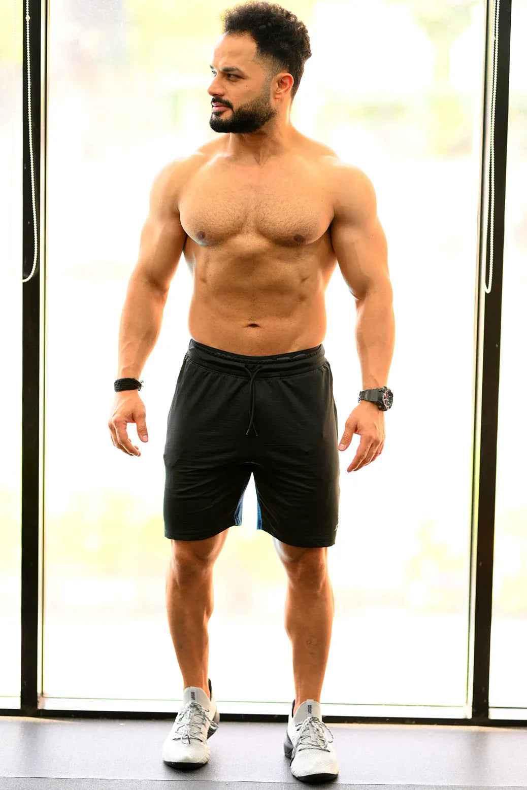 Fuaark Nz black and blue box jogger shorts, men's casual athletic shorts with comfortable fit and stylish design.