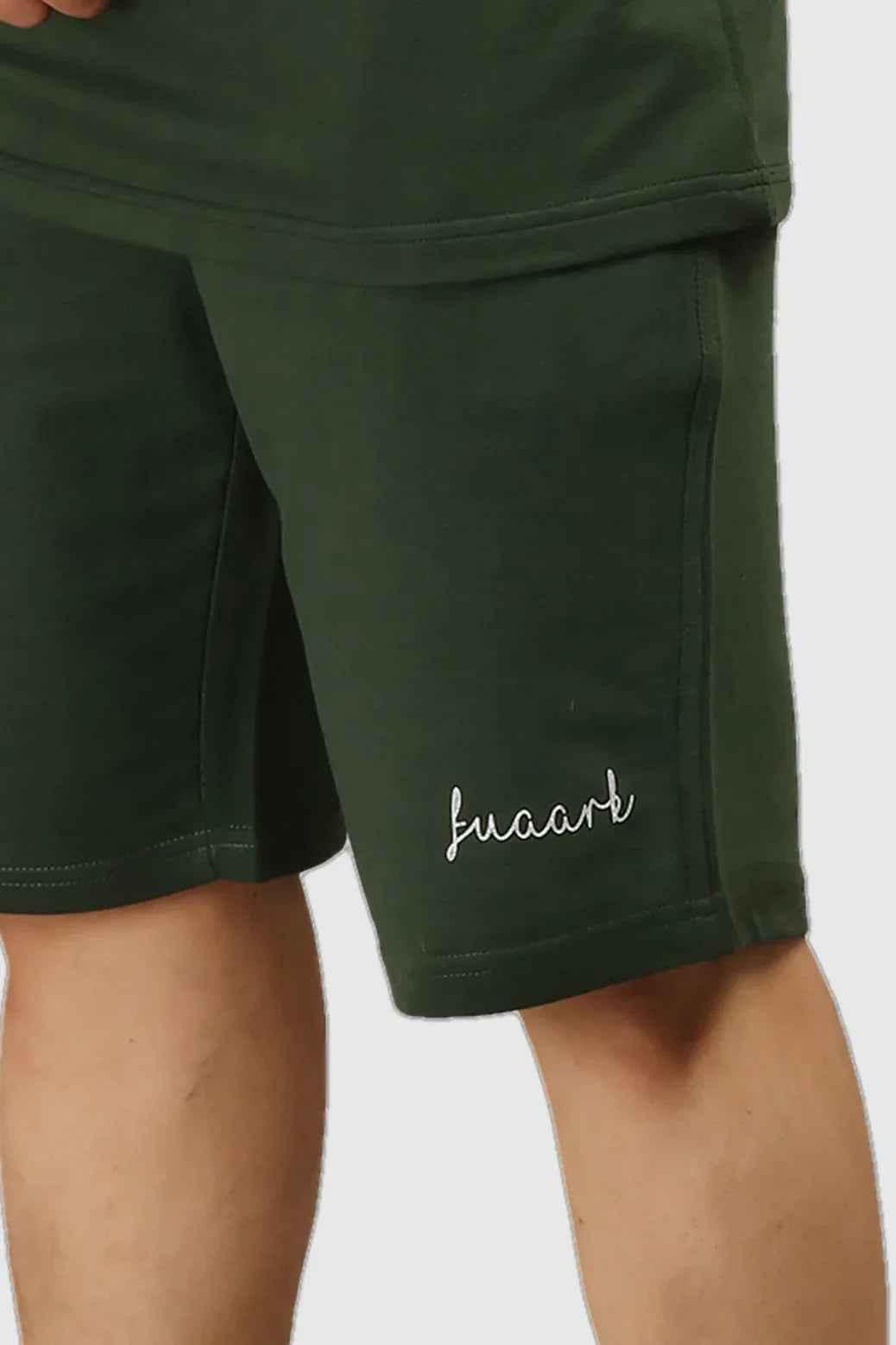Oversized green Fuaark Nz jogger shorts with relaxed fit, perfect for comfort and casual style, shown on a model.