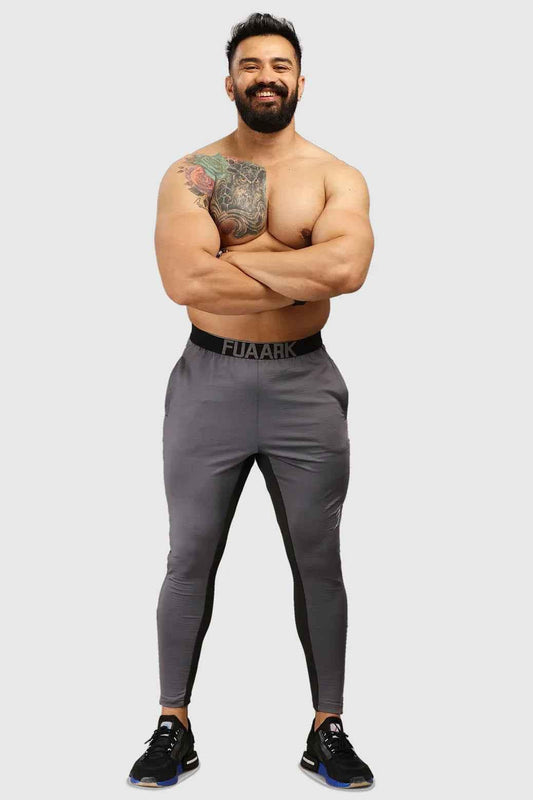 Grey Fuaark Nz joggers with box track design, showcasing a comfortable, versatile fit and casual style.