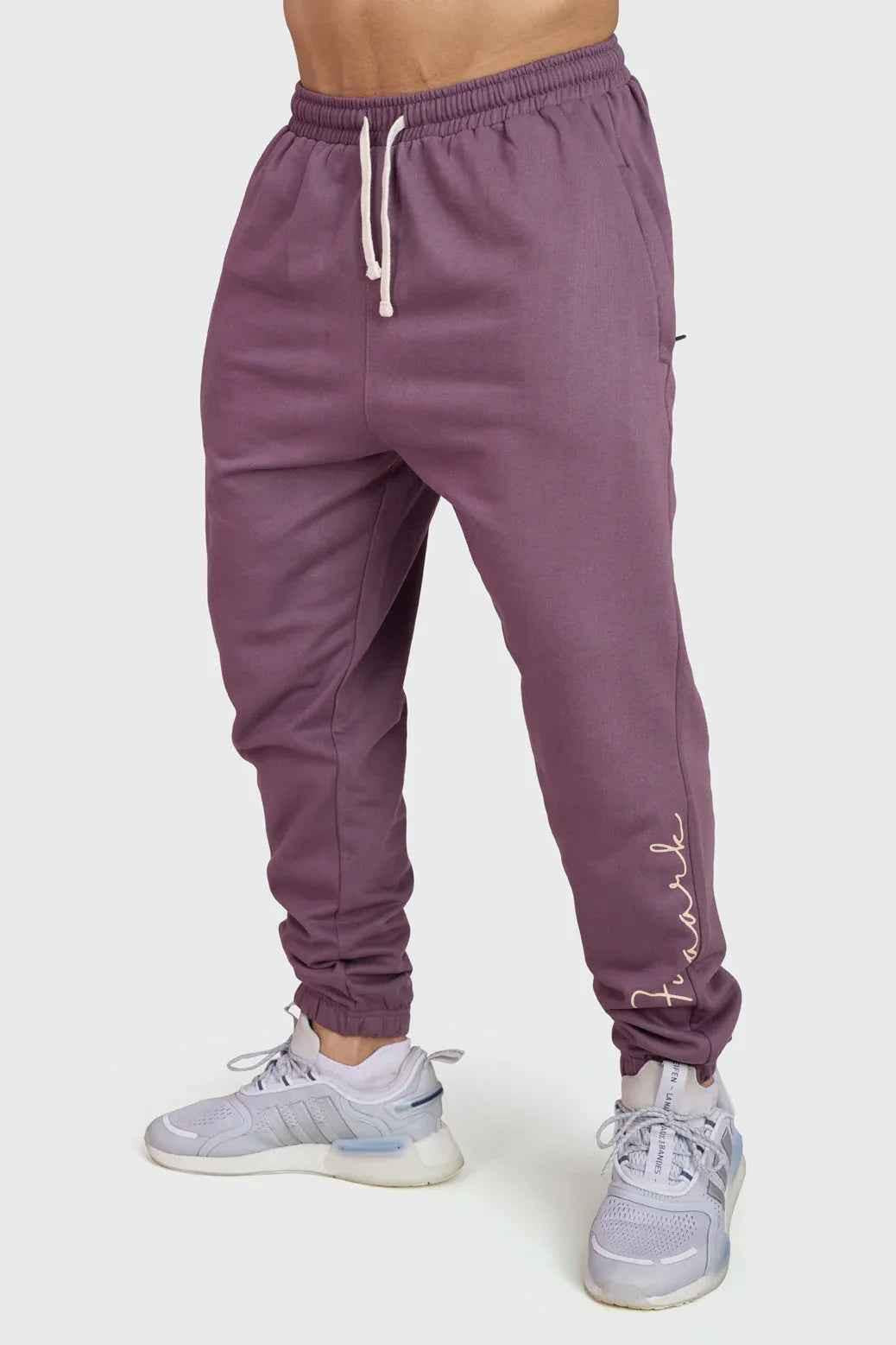 Fuaark Nz mauve oversized joggers for women, comfortable and stylish, shown on a model with relaxed fit and soft fabric.