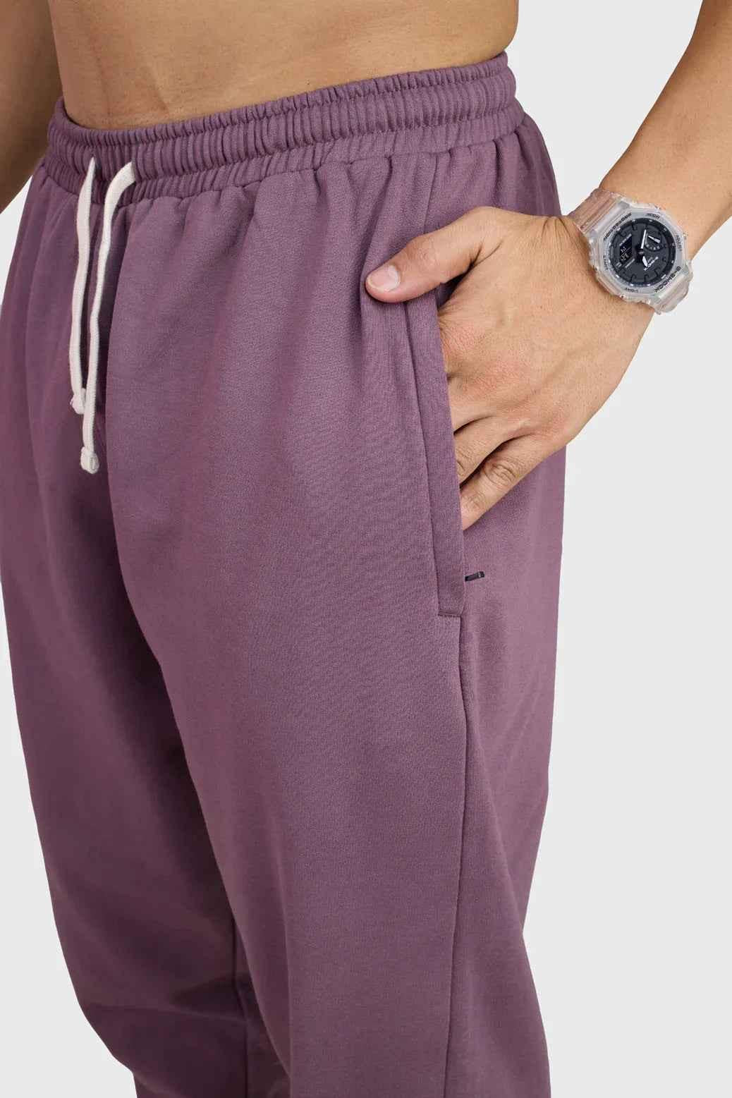 Fuaark Nz mauve oversized joggers, stylish and comfortable, shown on a model with relaxed fit and soft fabric for casual wear.