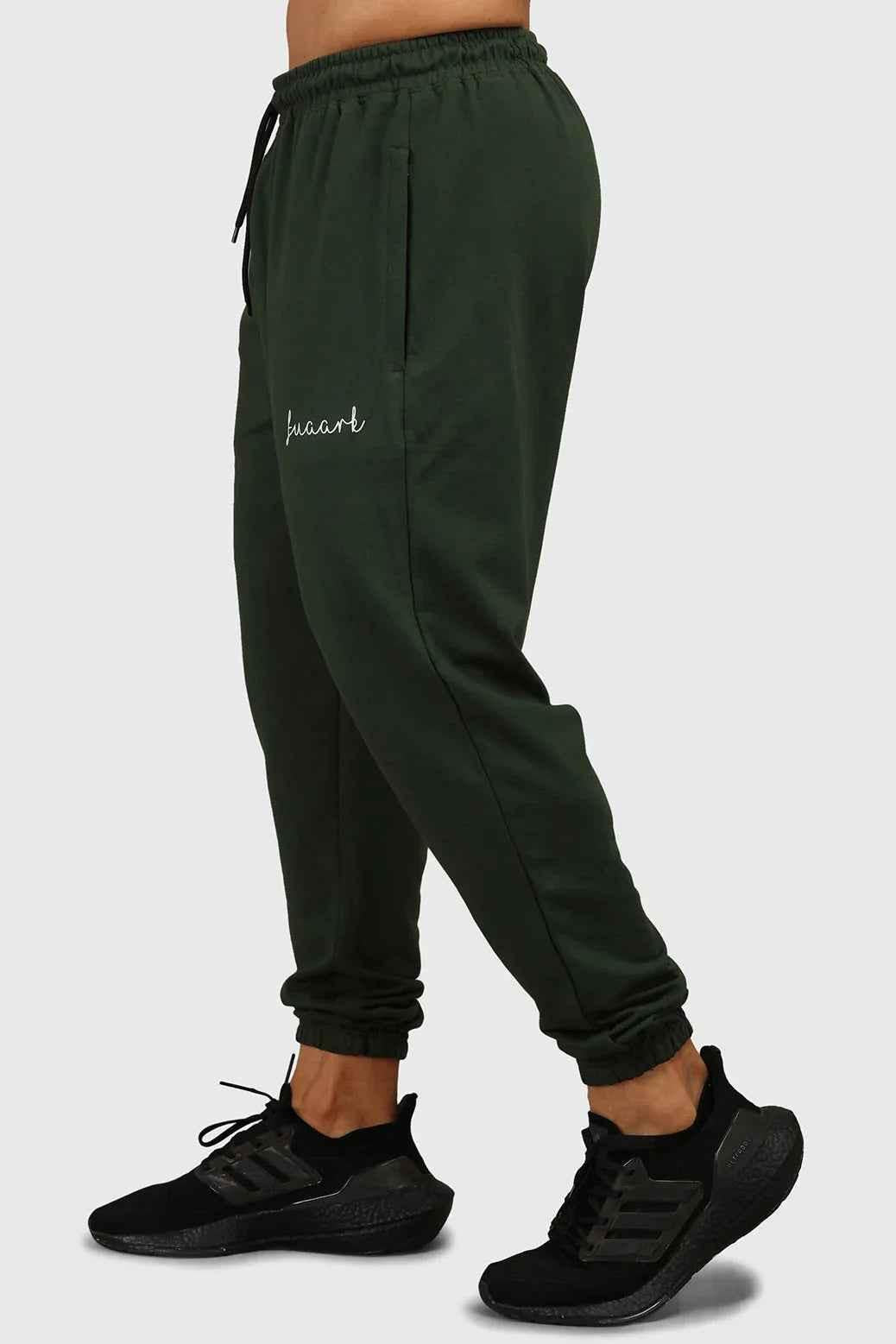 Green fall joggers by Fuaark Nz featuring a comfortable regular fit, perfect for autumn casual wear.