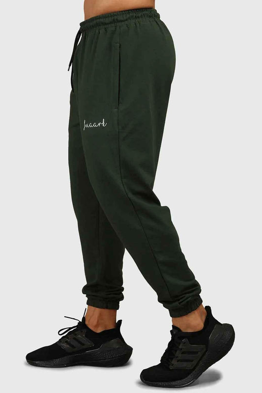 Green fall joggers by Fuaark Nz featuring a comfortable regular fit, perfect for autumn casual wear.
