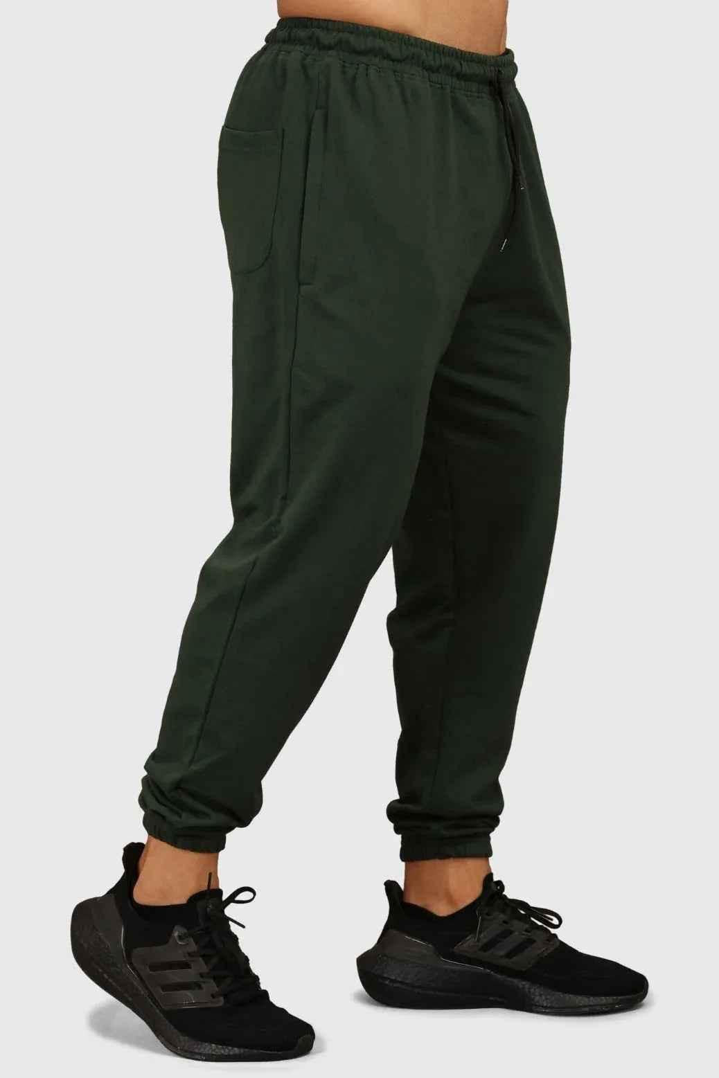 Green fall joggers by Fuaark Nz with a comfortable regular fit, ideal for autumn casual wear.