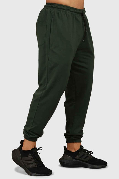 Green fall joggers by Fuaark Nz with a comfortable regular fit, ideal for autumn casual wear.