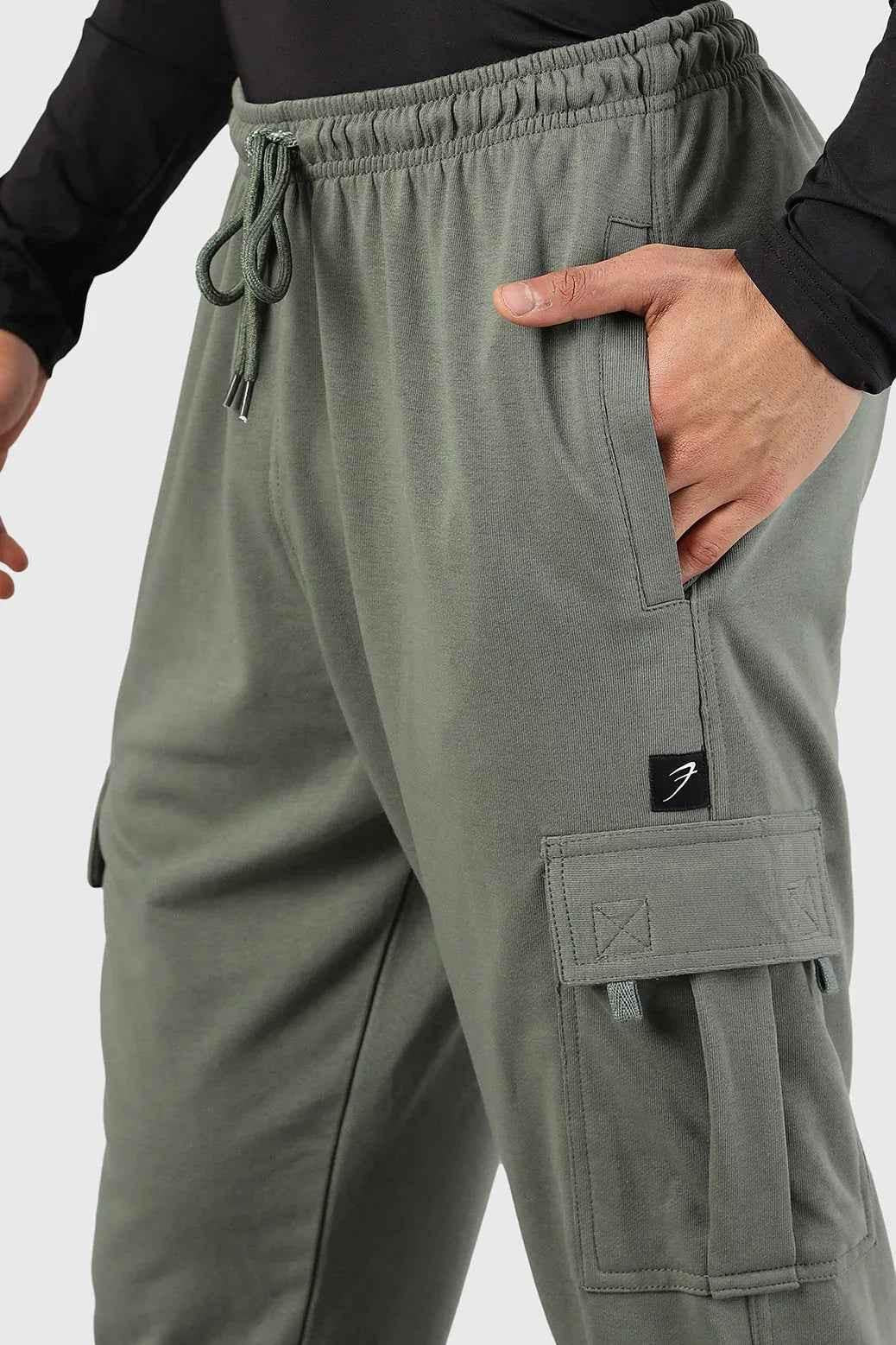 Olive green Flex Joggers by Fuaark NZ, casual fit with elastic waistband and cuffs, soft fabric for everyday comfort