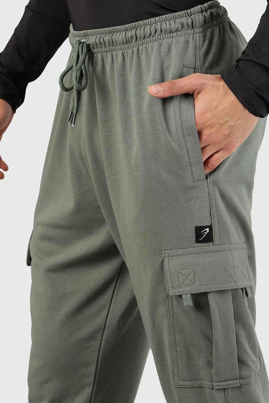 Olive green Flex Joggers by Fuaark NZ, casual fit with elastic waistband and cuffs, soft fabric for everyday comfort