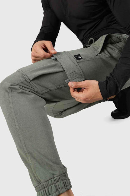 Olive green Fuaark NZ Flex Joggers shown on a model, featuring a relaxed fit and comfortable elastic waistband.