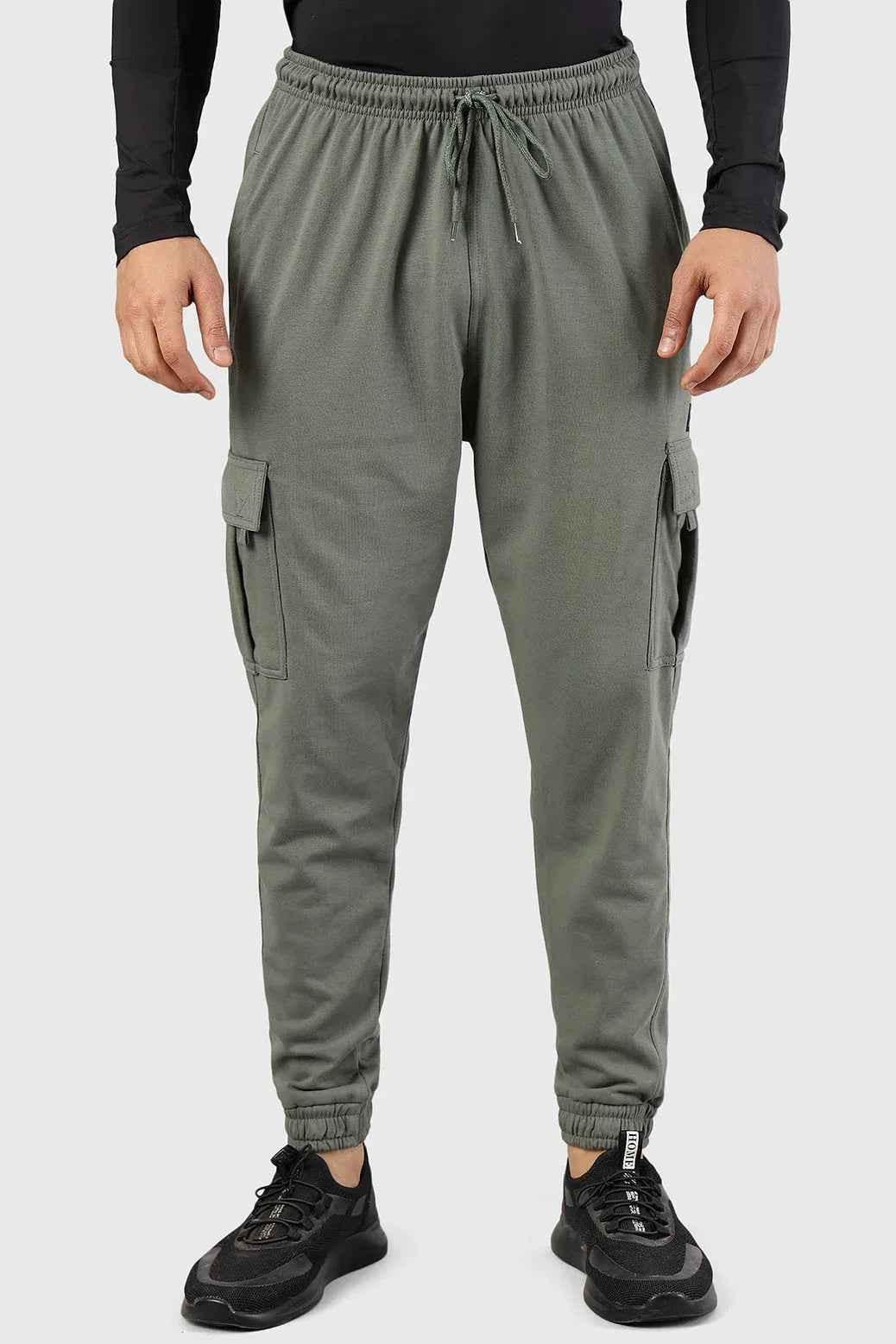 Fuaark Nz Flex Joggers in olive color, featuring a relaxed fit and elastic waistband, casual athletic wear for men.