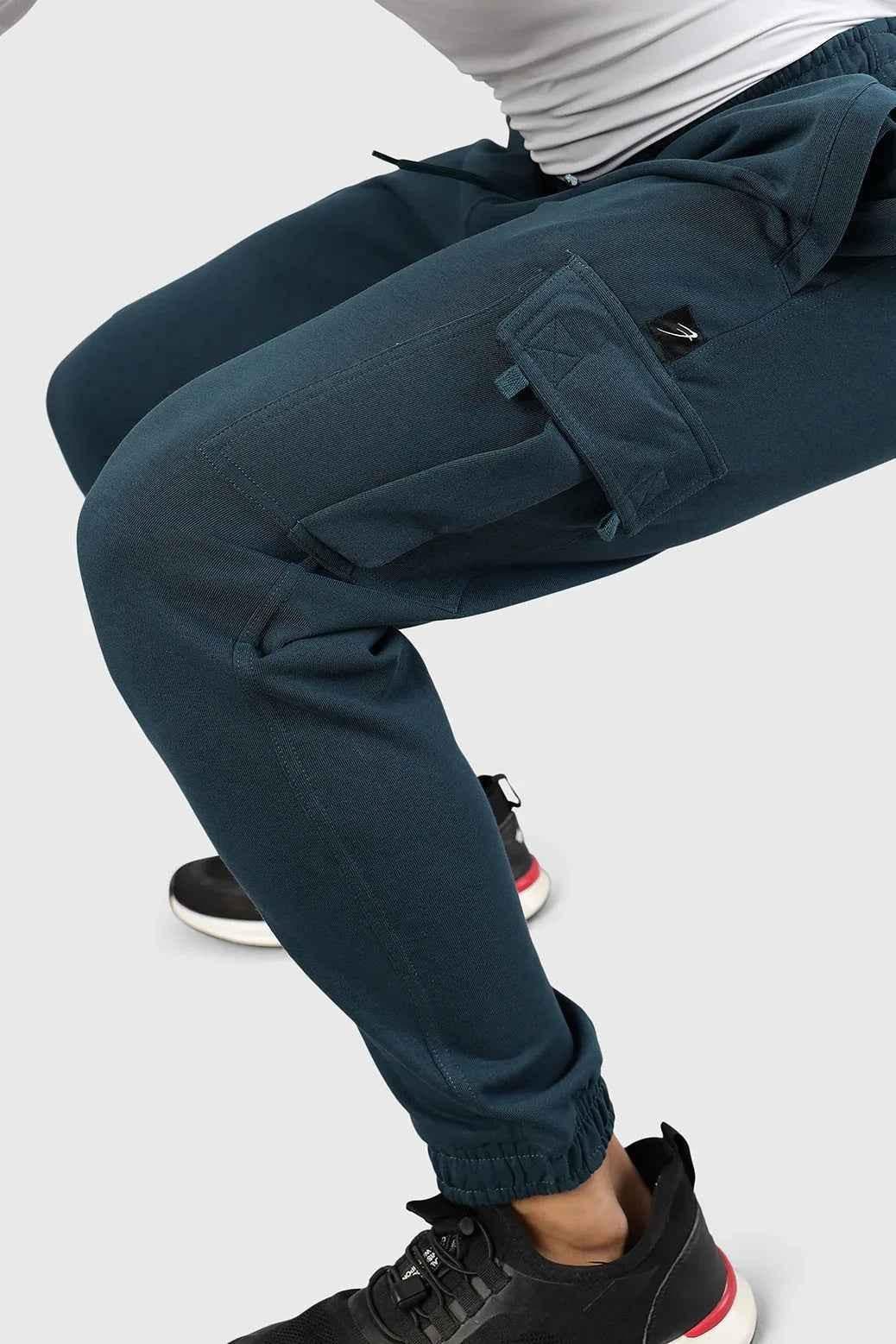 Teal Flex Joggers by Fuaark Nz featuring a relaxed fit and elastic waistband, perfect for casual wear and active lifestyles.