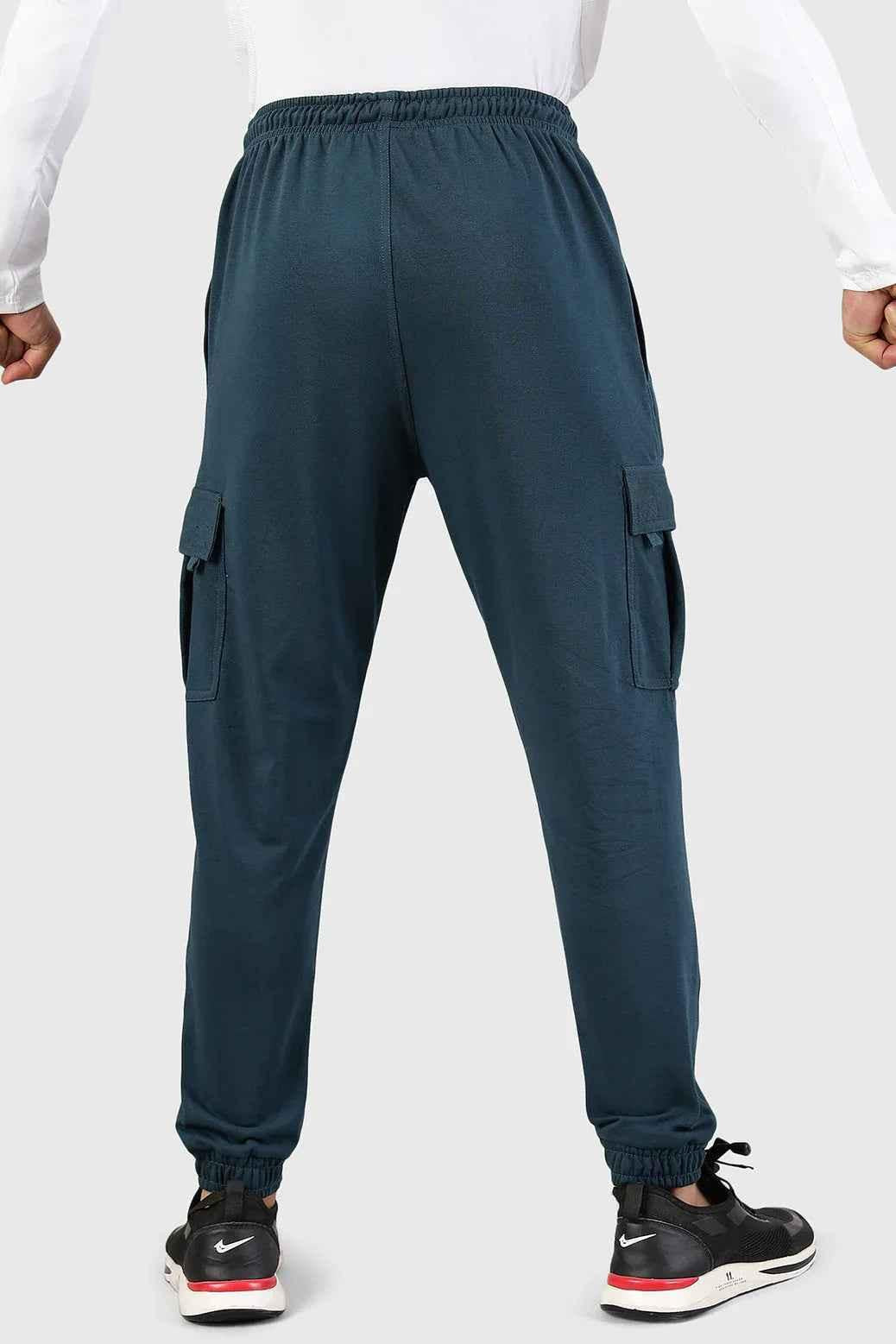 Teal Flex Joggers by Fuaark Nz, showcasing the comfortable fit and stylish design of these casual joggers.