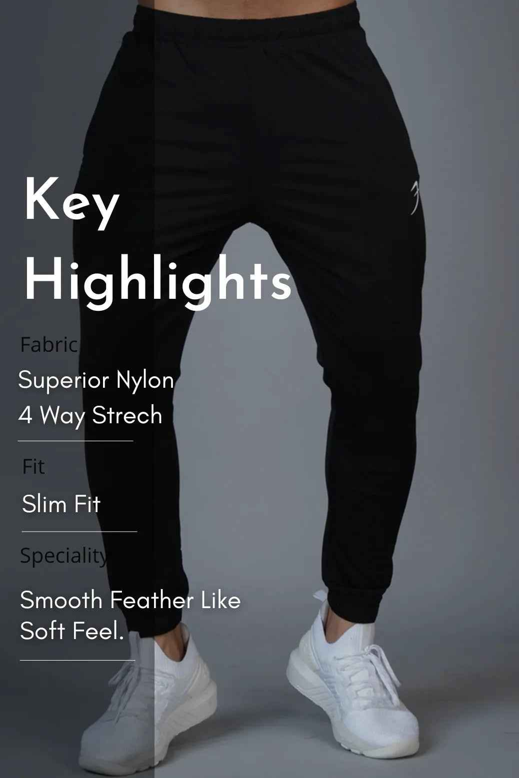 Black Fuaark Nz Identity Nylon Joggers with elastic waistband and tapered fit, shown on a model.
