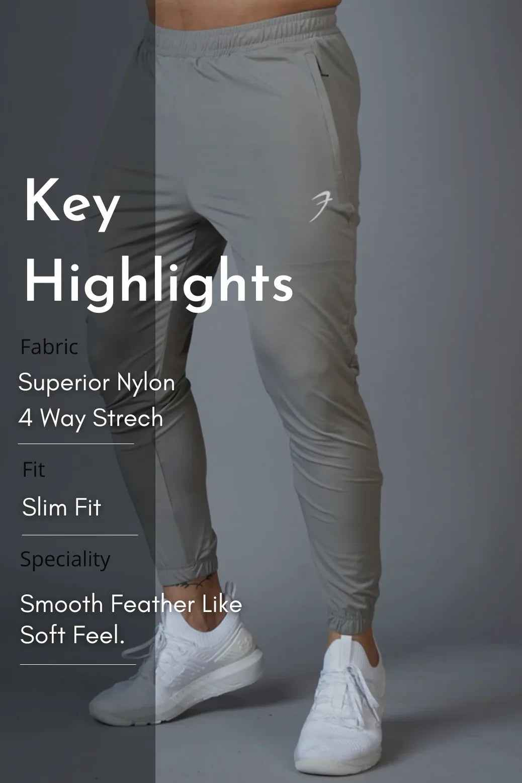 Light grey nylon joggers from Fuaark Nz's Identity collection, featuring a comfortable fit and casual style.