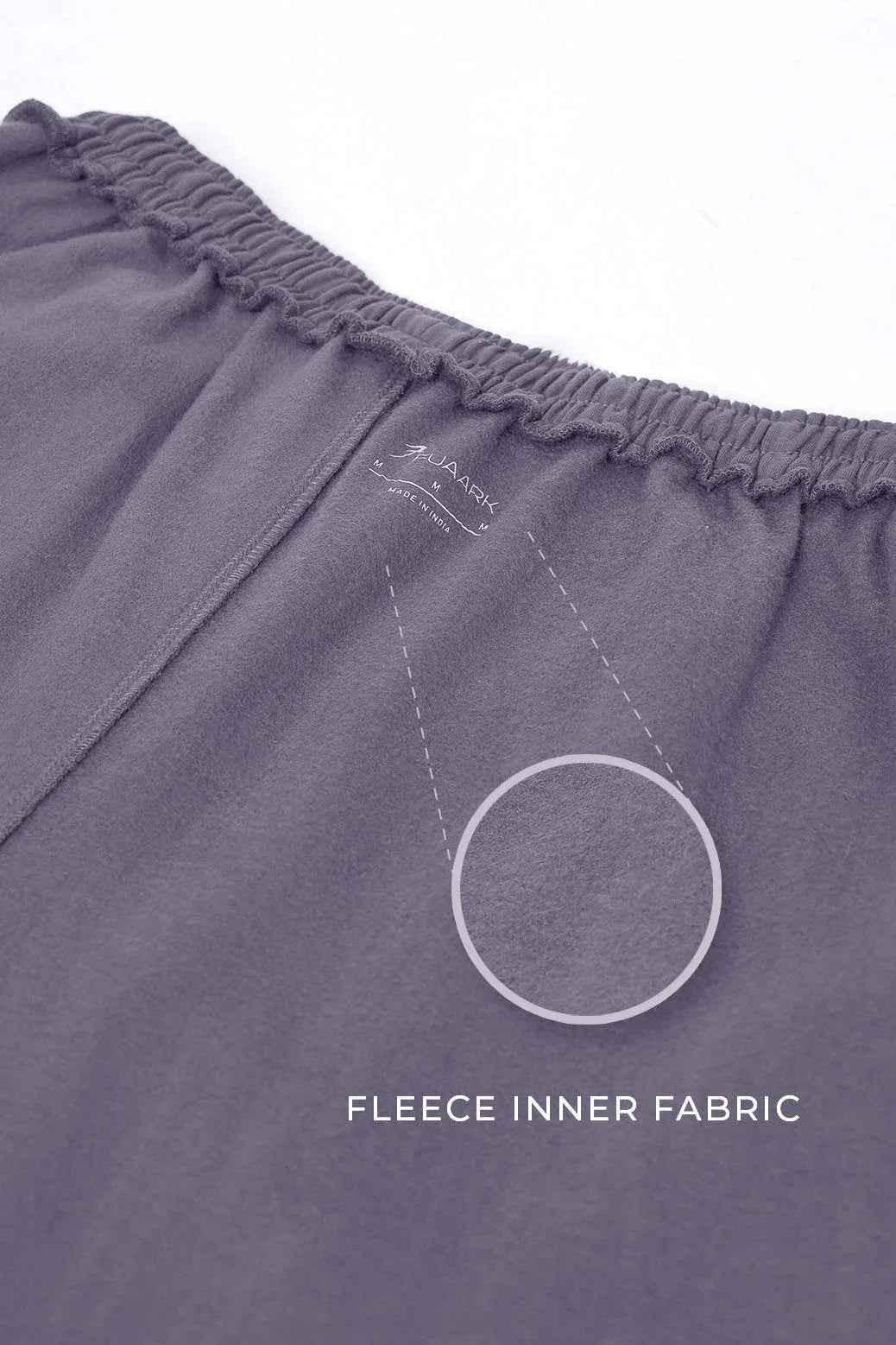 Dark grey Fuaark Nz joggers with relaxed fit, soft fabric, and comfortable waistband, ideal for casual wear and lounging.