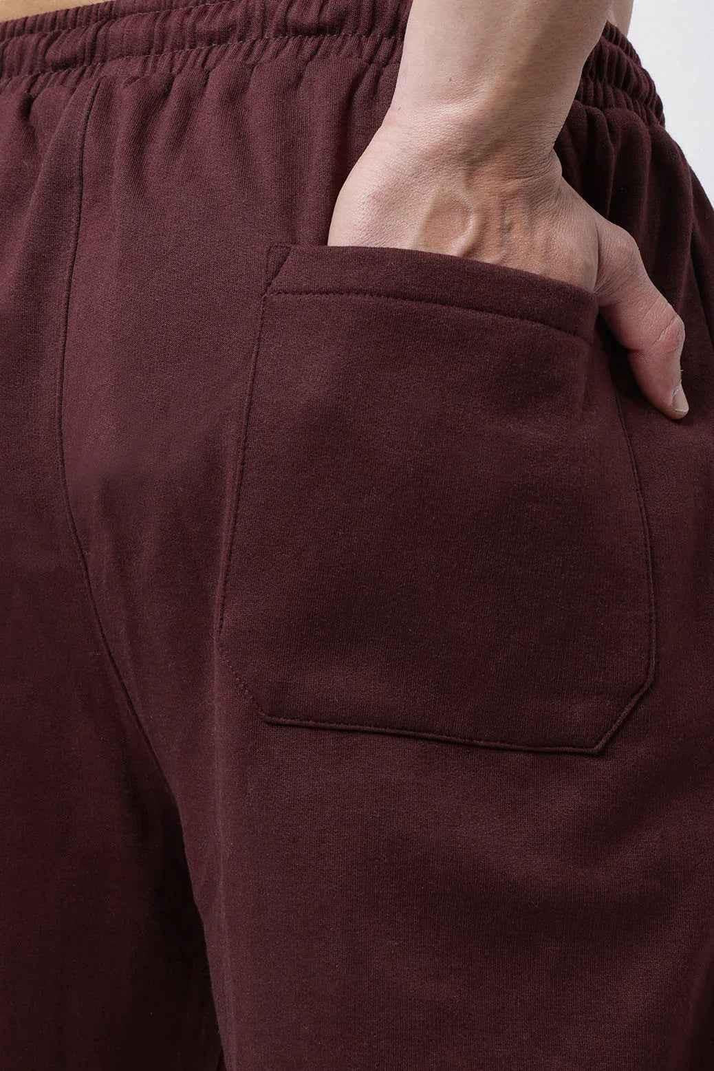 Fuaark Nz laidback relaxed brown joggers for ultimate comfort, featuring a soft fabric and casual fit, shown on a model.
