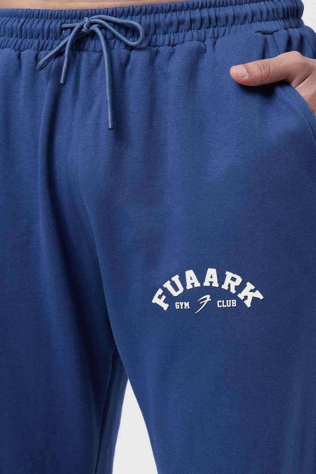 Fuaark Nz navy joggers, laidback relaxed fit, comfortable casual pants for everyday wear, shown on a model.