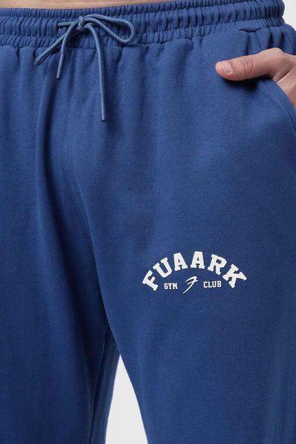 Fuaark Nz navy joggers, laidback relaxed fit, comfortable casual pants for everyday wear, shown on a model.
