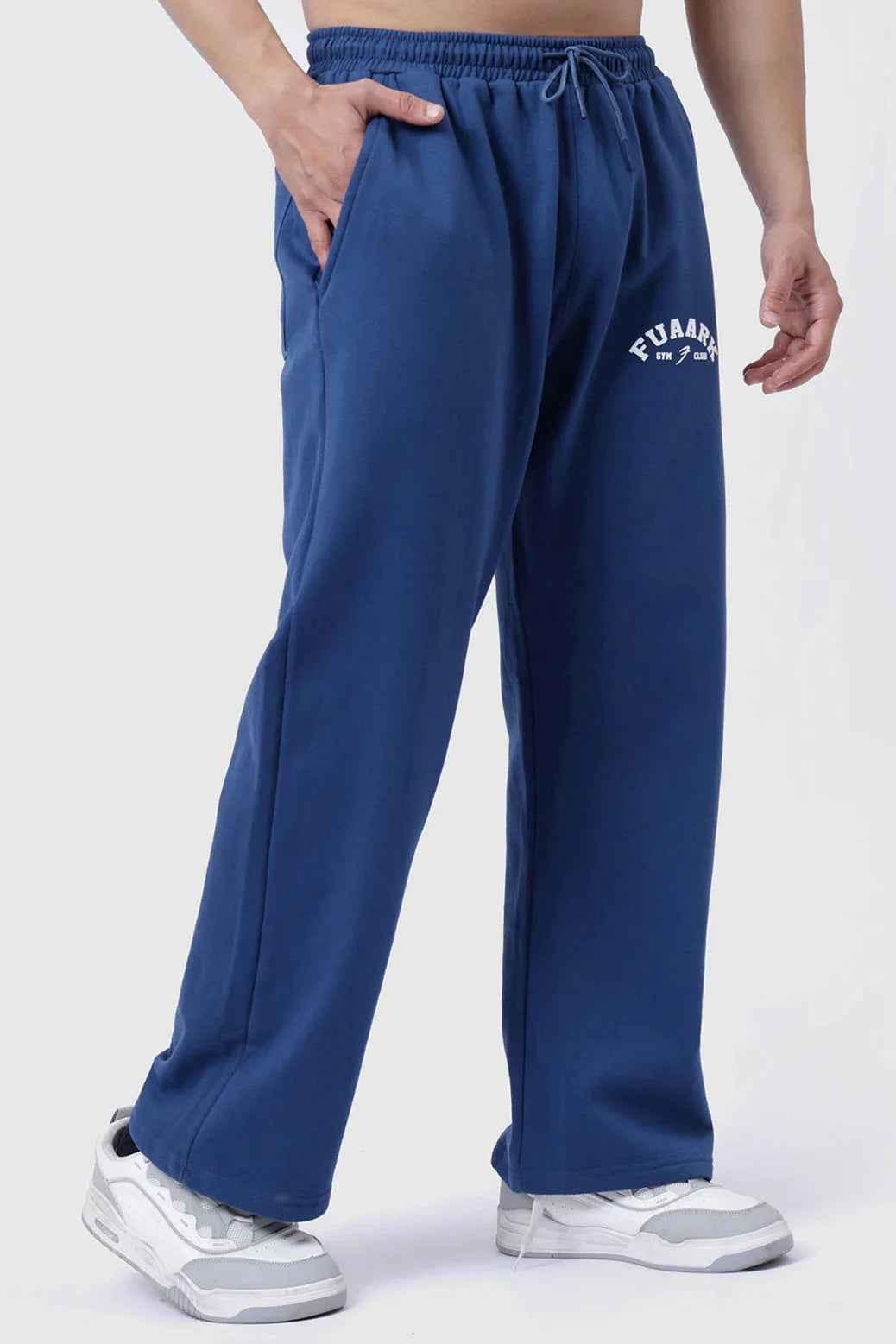 Fuaark Nz navy relaxed fit joggers, laidback style, soft fabric, comfortable for casual wear, shown on a model.