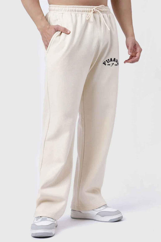 Beige Fuaark Nz laidback relaxed joggers pants, comfortable casual fit with elastic waistband and tapered leg design.