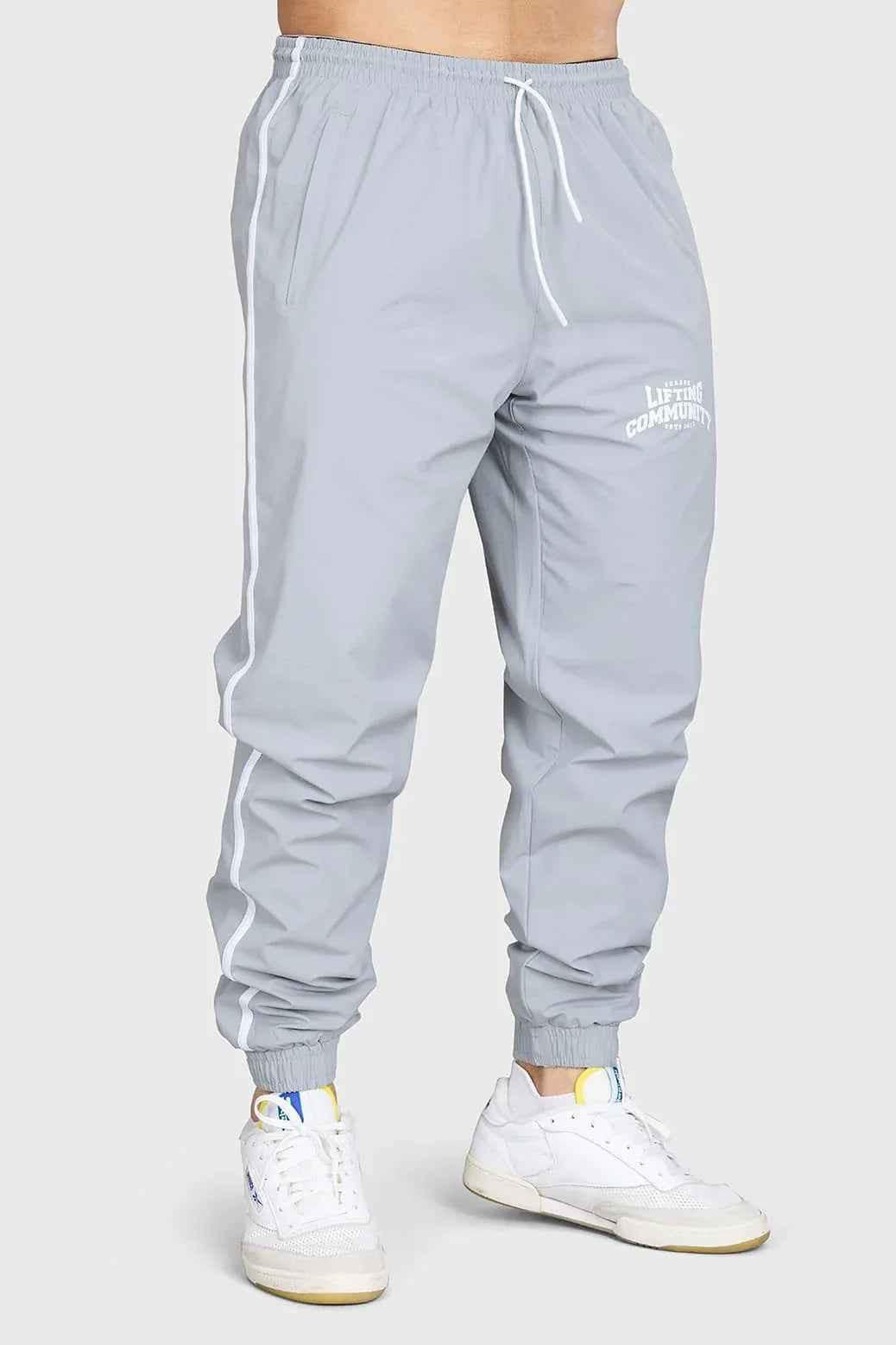 Light grey Fuaark Nz Lifting Community Joggers, comfortable fit, casual style, shown on a model.