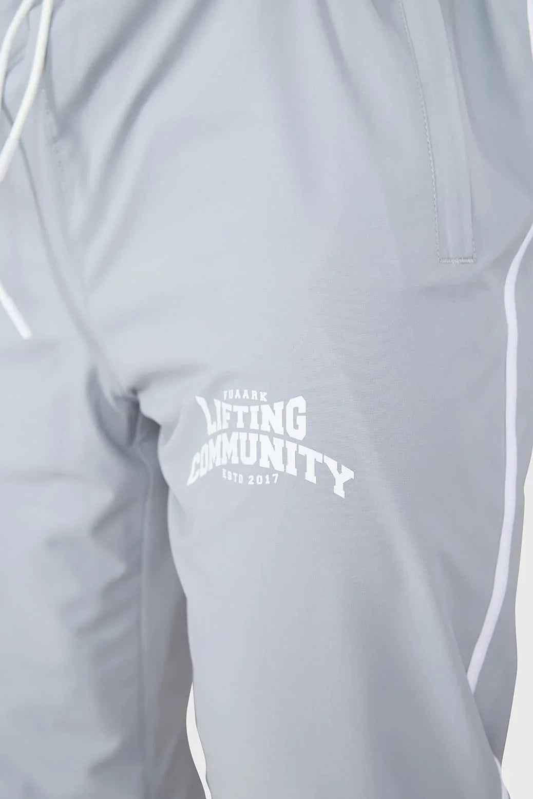 Light grey Fuaark Nz Lifting Community Joggers, casual athletic pants with a relaxed fit and drawstring waist.