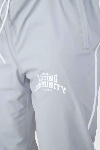 Light grey Fuaark Nz Lifting Community Joggers, casual athletic pants with a relaxed fit and drawstring waist.