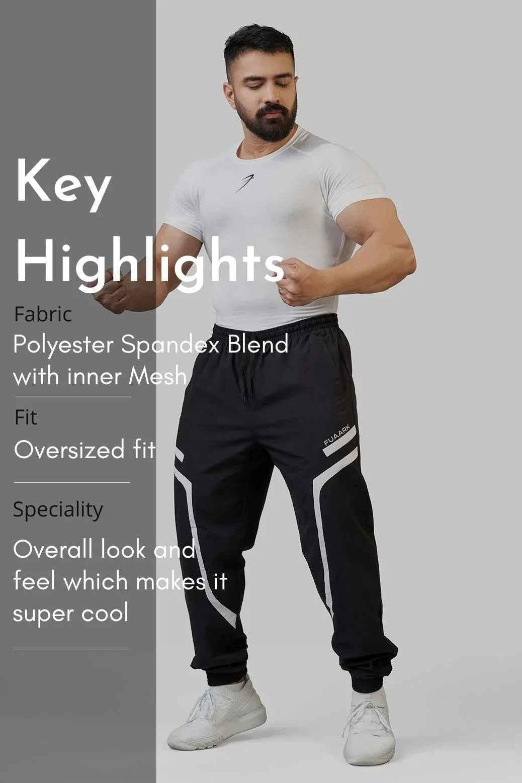 Black Momentum Joggers by Fuaark Nz, showing comfortable fit and casual style, with elastic waistband and tapered legs.