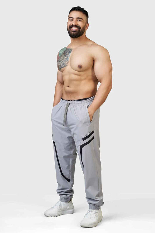 Fuaark Nz Momentum Joggers in light grey, casual athletic pants with elastic waistband and tapered fit, displayed on a neutral background