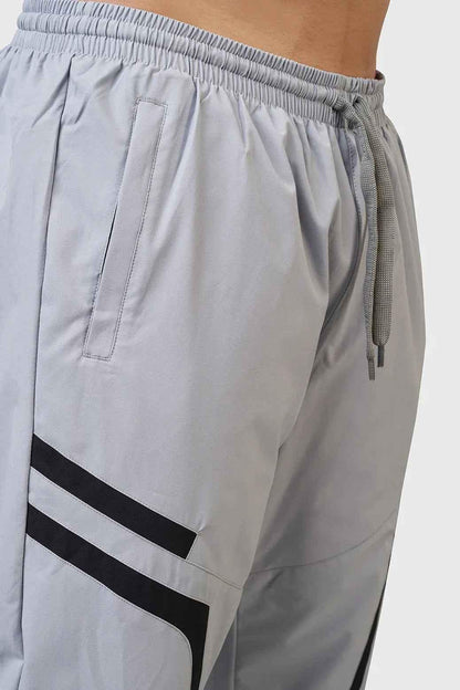 Light grey Fuaark Nz Momentum Joggers, comfortable athletic pants with a relaxed fit and drawstring waistband.